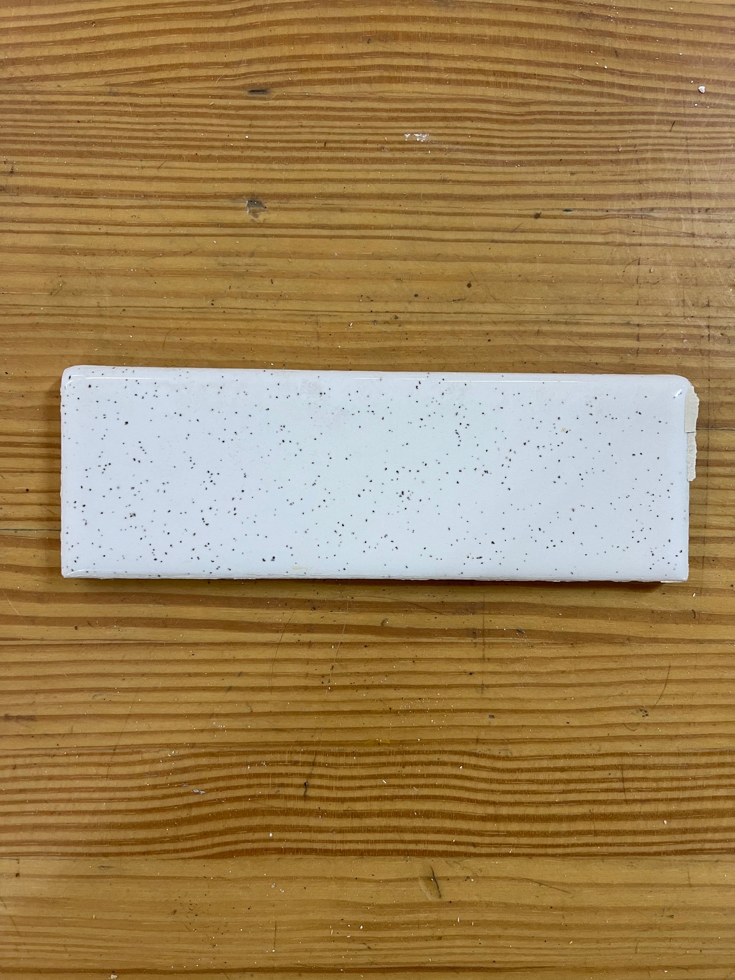 1960s Bullnose White with Black Speckled Tile 2”x6”